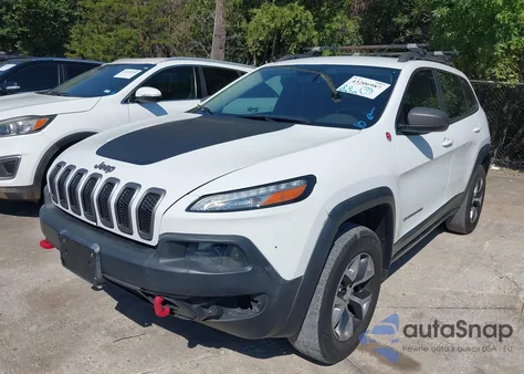 2014 Jeep Cherokee Trailhawk from USA, damaged, VIN 1C4PJMBSXEW212295